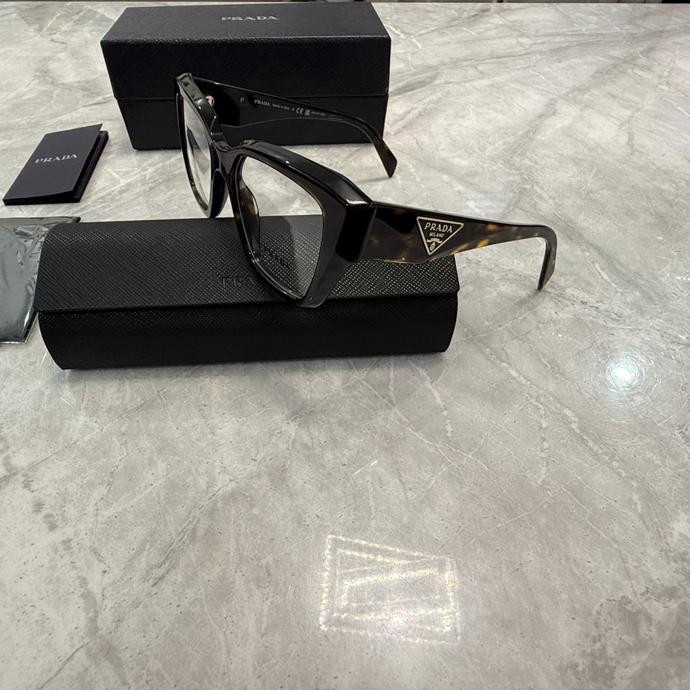 The PRADA PR 09ZV VAU1O1 Honey Tortoise Women's 100 % authentic